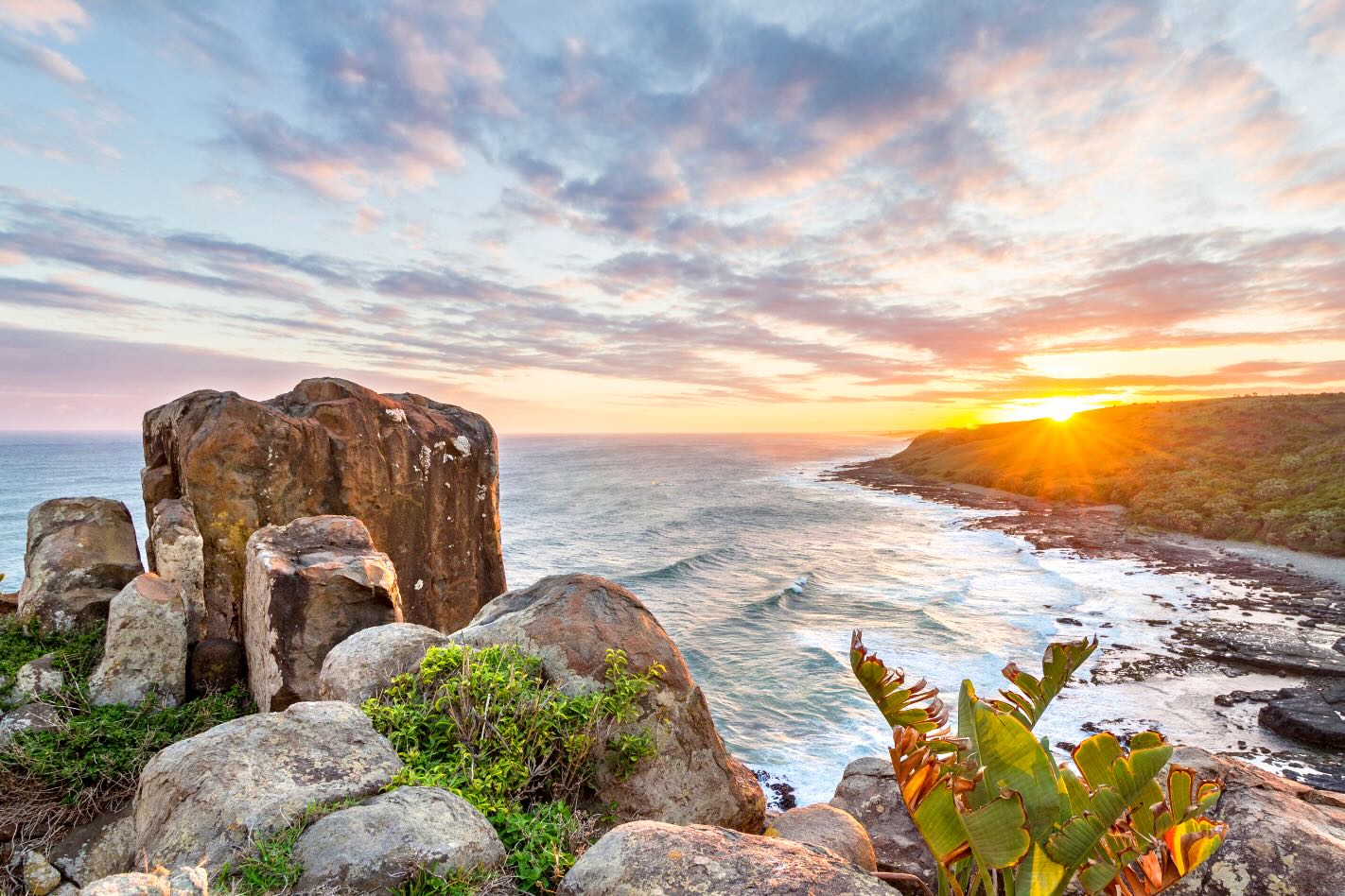 Sunrise Over Rocky Bluff